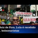 Já eleito pelas pesquisas, Lula é recebido em Juiz de Fora com placas de ladrão